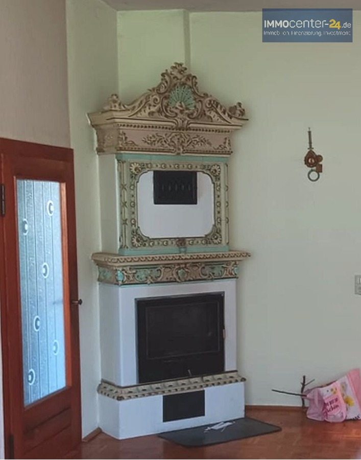 Kachelofen im Wohnzimmer Einfamilienhaus Gartz